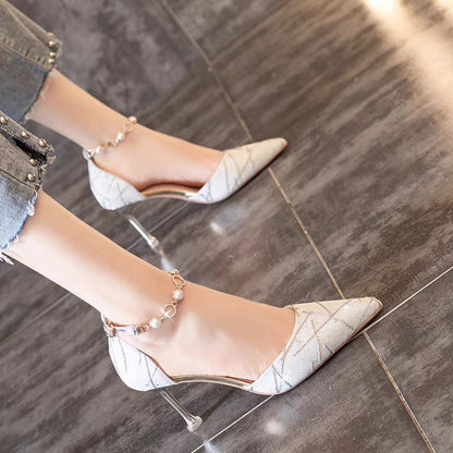 Sleek pointed heels with rhinestone strap—elegant, sexy, and made to shine.