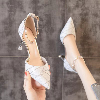 Sleek pointed heels with rhinestone strap—elegant, sexy, and made to shine.